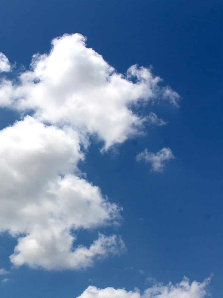 Photography of a cloudy, sunny, blue sky.