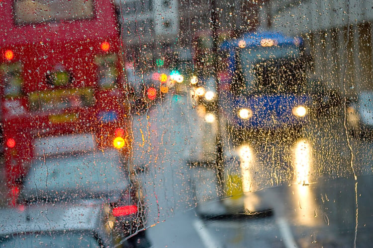 Photography of london traffic in the rain
