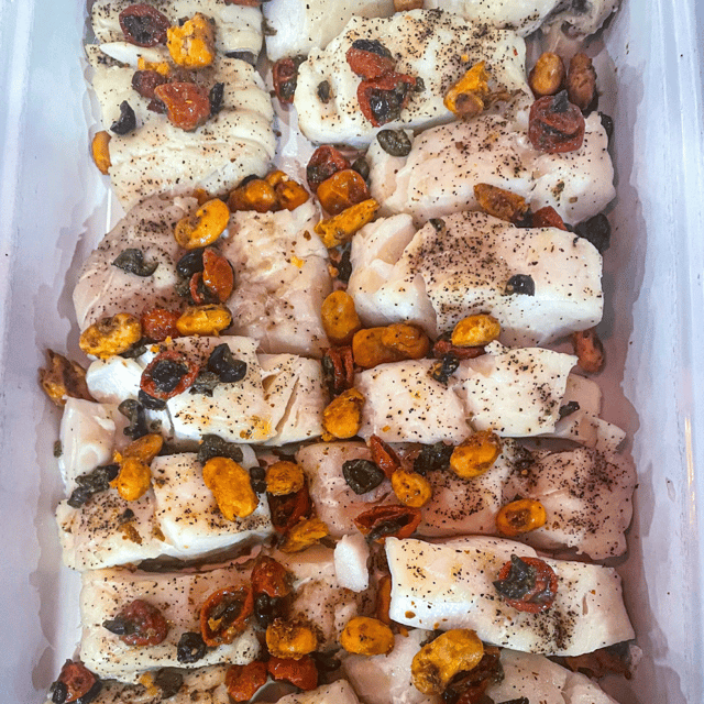 Photograph of a fish dish with pulses offered as a buffet lunch by contract caterer Fooditude