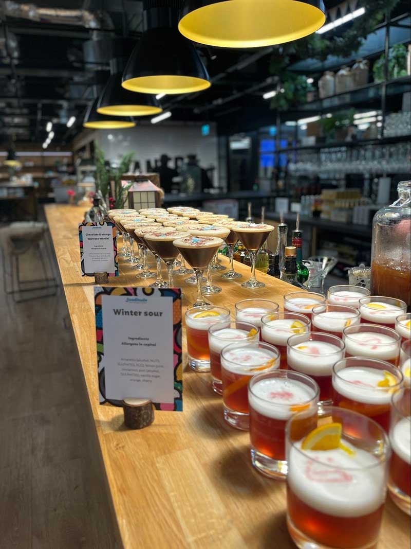 A large table filled with cocktails